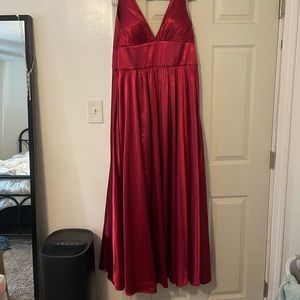 Long maroon dress with a slit